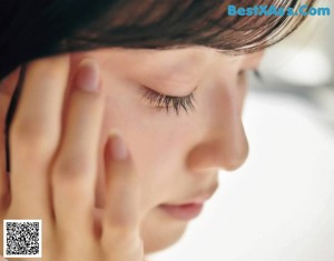 a magazine with a woman's face on the cover